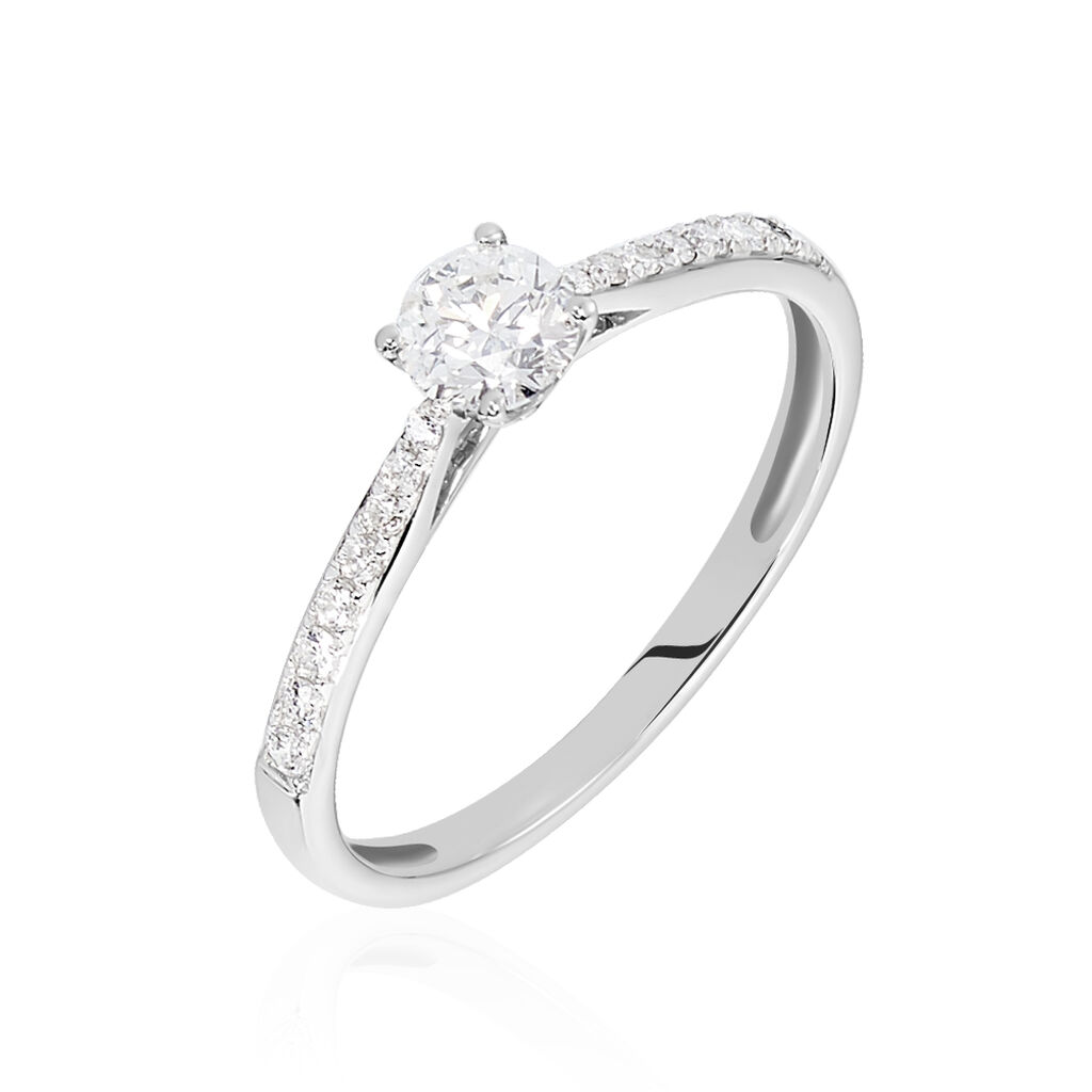 Anillo en Oro Blanco de 18k con Diamante Central y Diamantes Laterales