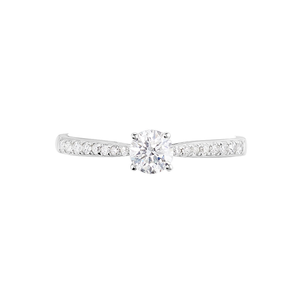 Anillo en Oro Blanco de 18k con Diamante Central y Diamantes Laterales