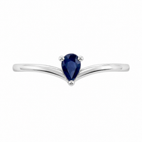 Anillo de oro blanco 18k con zafiro azul en forma de pera. 