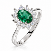 Anillo de esmeralda natural ovalada con diamantes naturales en oro blanco 18k