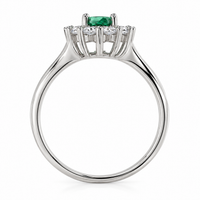 Anillo de esmeralda natural ovalada con diamantes naturales en oro blanco 18k