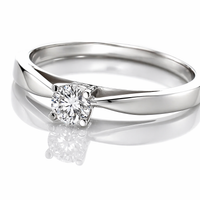 Anillo solitario con diamante redondo