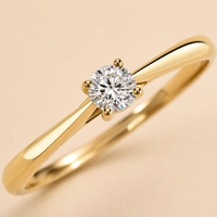Anillo solitario de oro amarillo con diamante natural