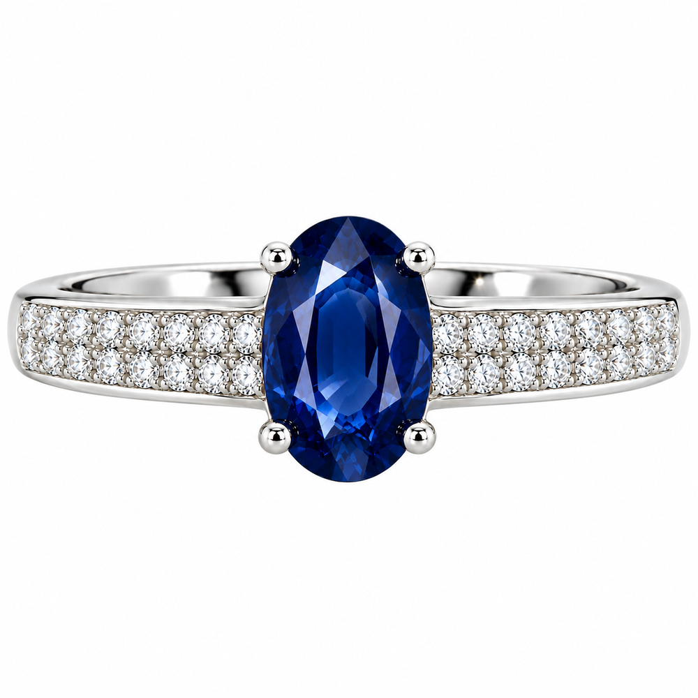 Anillo de compromiso con zafiro azul natural ovalado y diamantes naturales. 