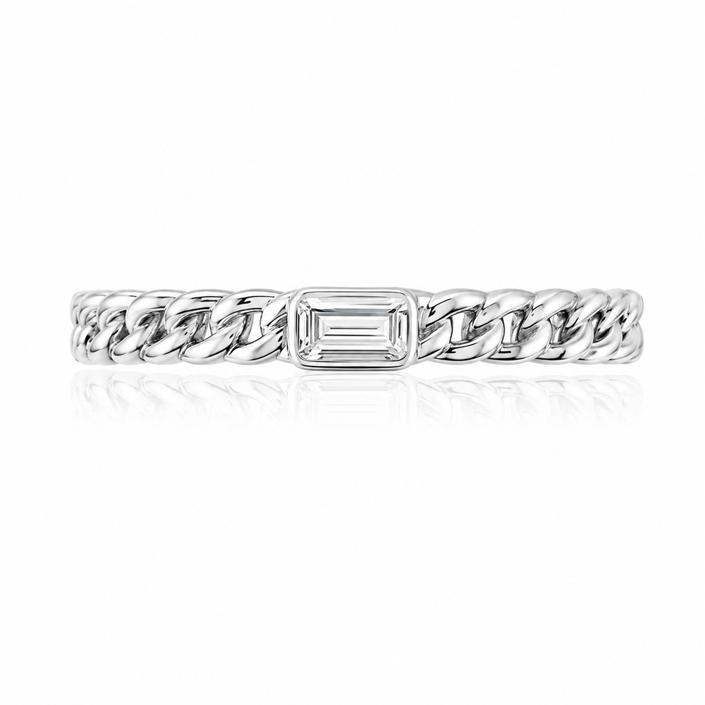 Anillo trenzado en oro blanco on diamante baguette