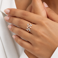 Anillo de oro rosado 18k con diamantes naturales diseño de hojas