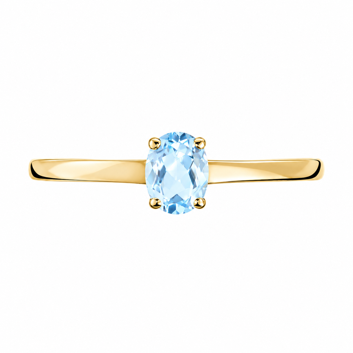 Anillo de oro amarillo 18k con topacio azul ovalado