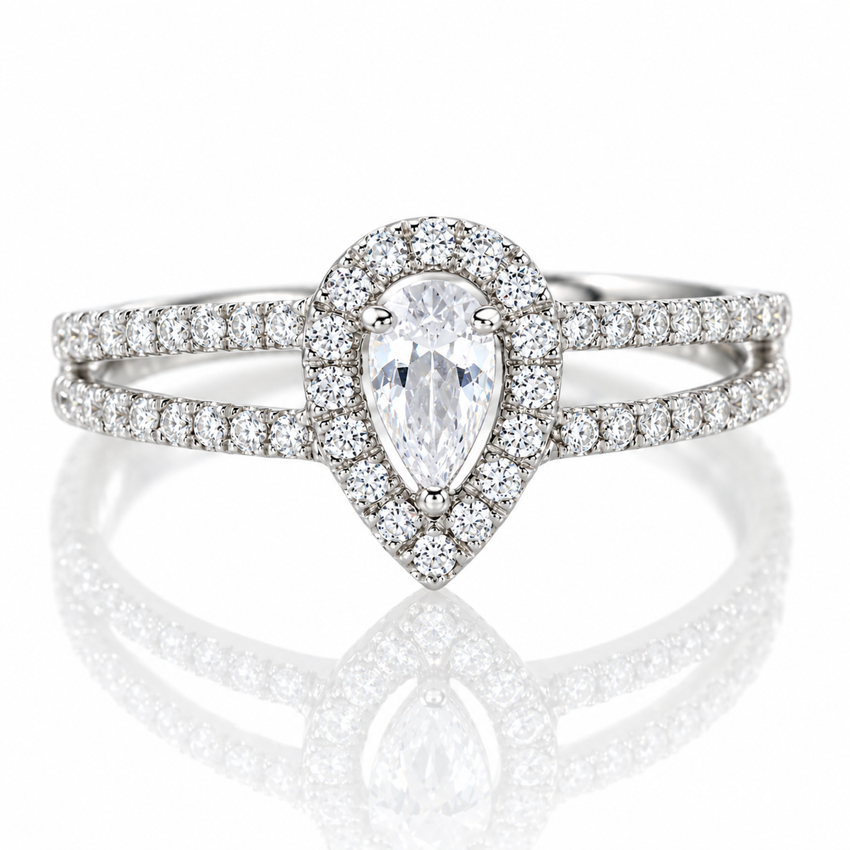 Anillo de compromiso con diamante en forma de pera en oro blanco 18k. 