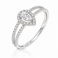 Anillo de compromiso con diamante en forma de pera en oro blanco 18k. 