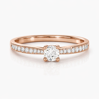 Anillo de compromiso de oro rosado con diamantes 