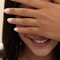 Anillo de compromiso en oro amarillo con diamante natural 