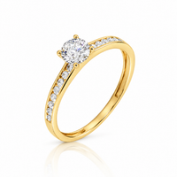 Anillo de oro amarillo 18k con diamantes naturales. 