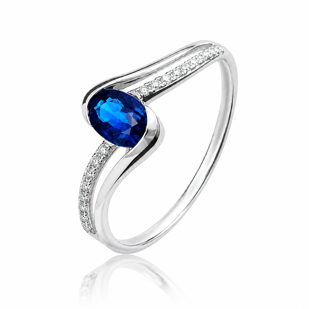 Anillo de zafiro azul en oro blanco con diamantes