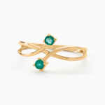 Anillo de Oro Amarillo 18K con Aros Entrelazados y Esmeraldas