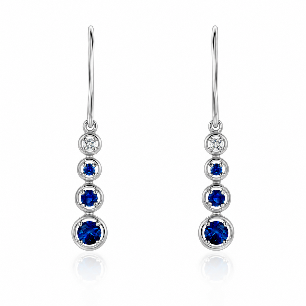 Aretes de oro blanco con zafiros y diamantes naturales. 