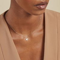 Collar Positano en oro amarillo 18k con dije de nácar en forma de corazón – Juli & Co