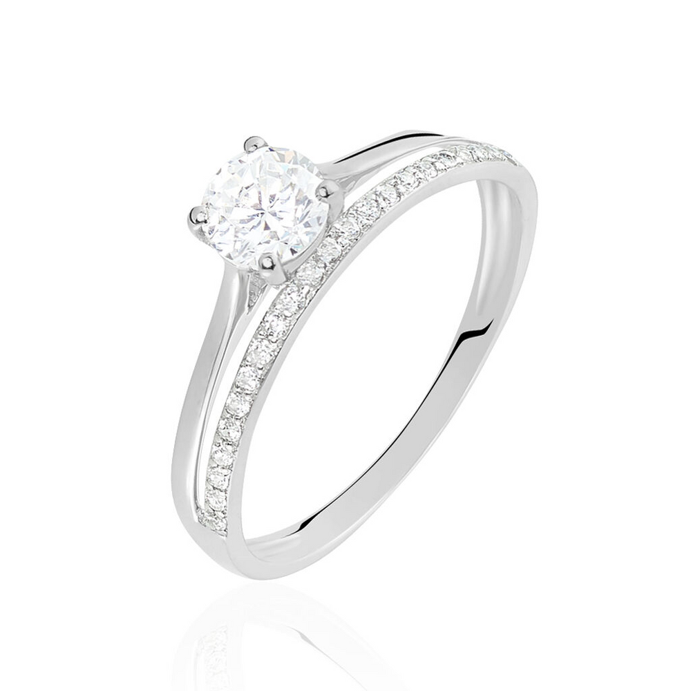 Anillo de compromiso con diamante: oro blanco 18k y diseño clasico.