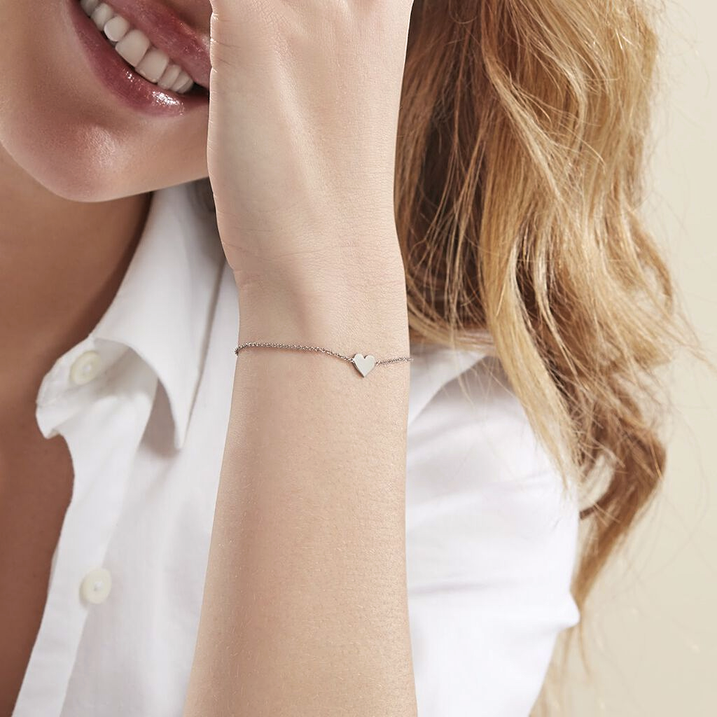 Pulsera Siena oro blanco 18k con dije corazón – Juli & Co