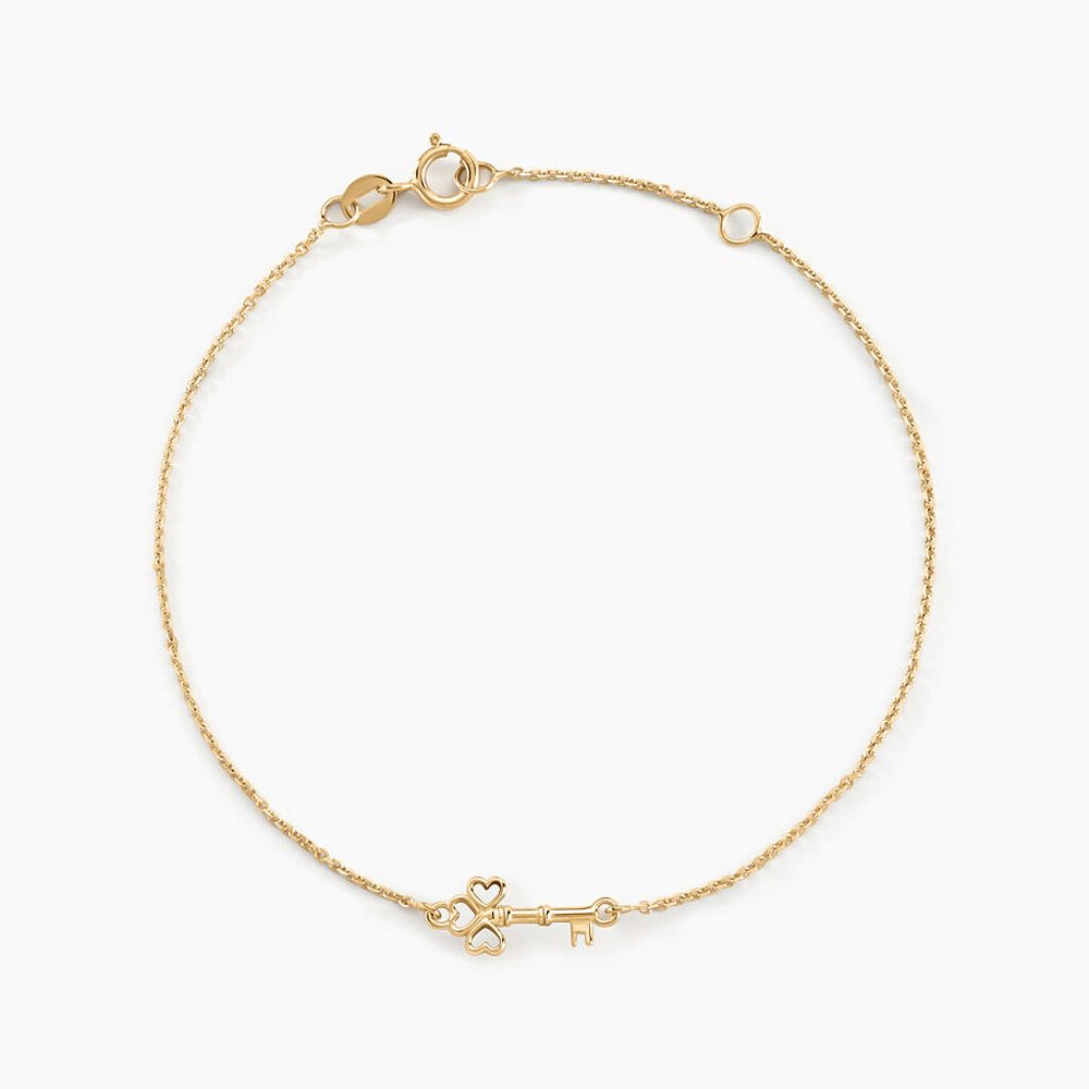 Pulsera Trinidad oro amarillo 18k con dije en forma de llave – Juli & Co